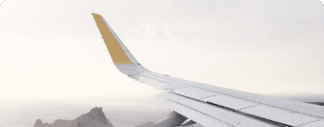 An airplane wing viewed from inside the aircraft